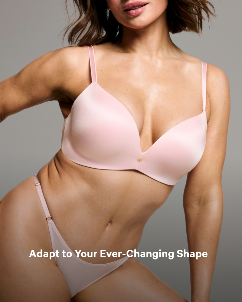 Woman wearing Victoria's Secret baby pink adaptable bra