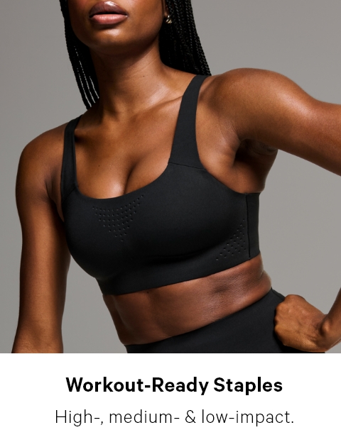 Woman wearing black Victoria's Secret Sport Bra
